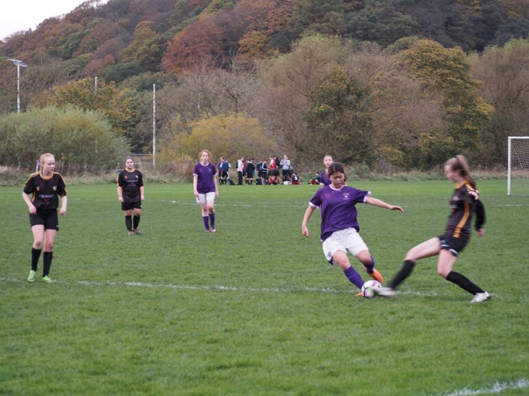 Aya playing football